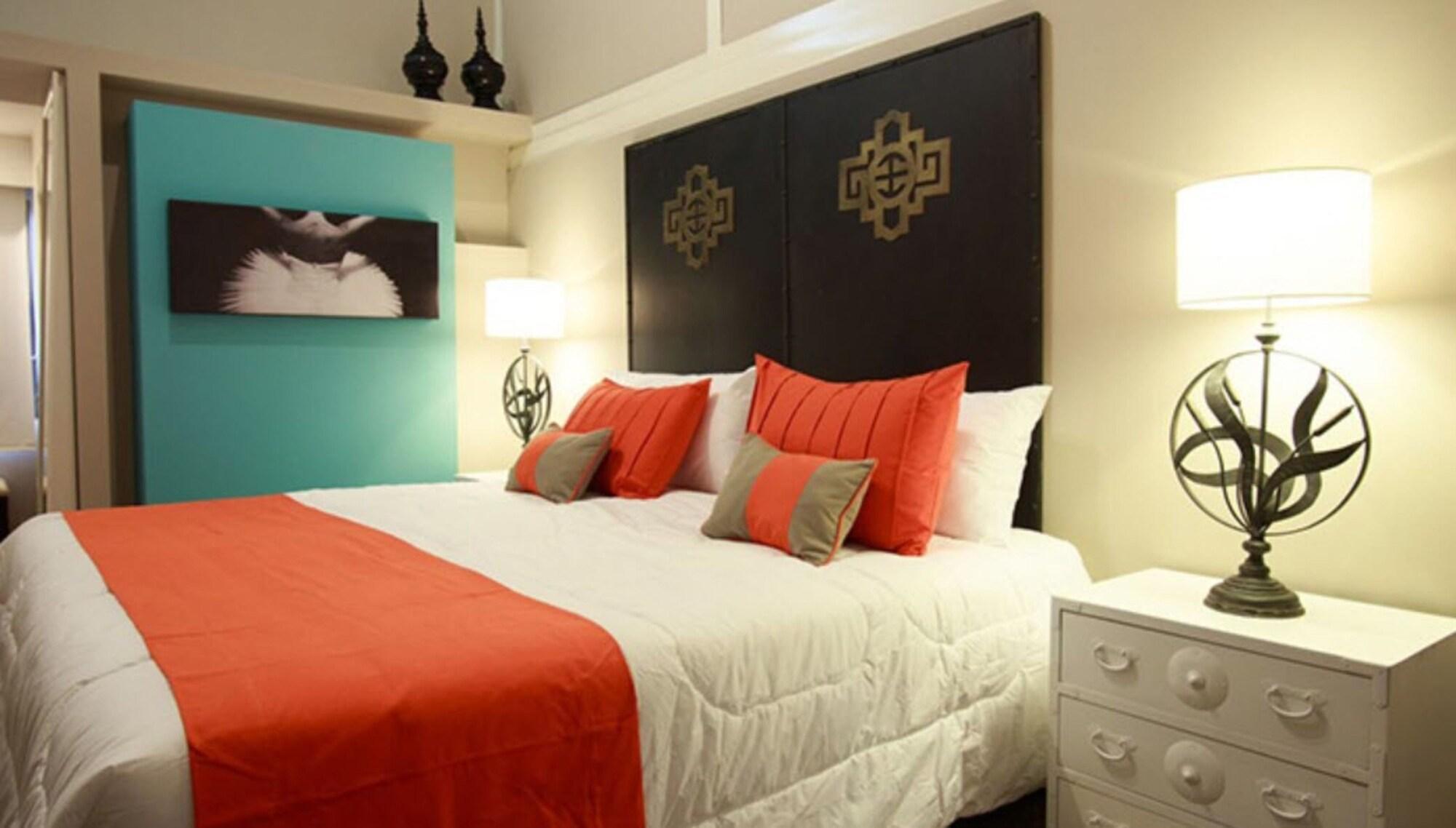 Spa Hotel La Reserve Colonia del Sacramento Luaran gambar A bedroom at the Inn at the Opera